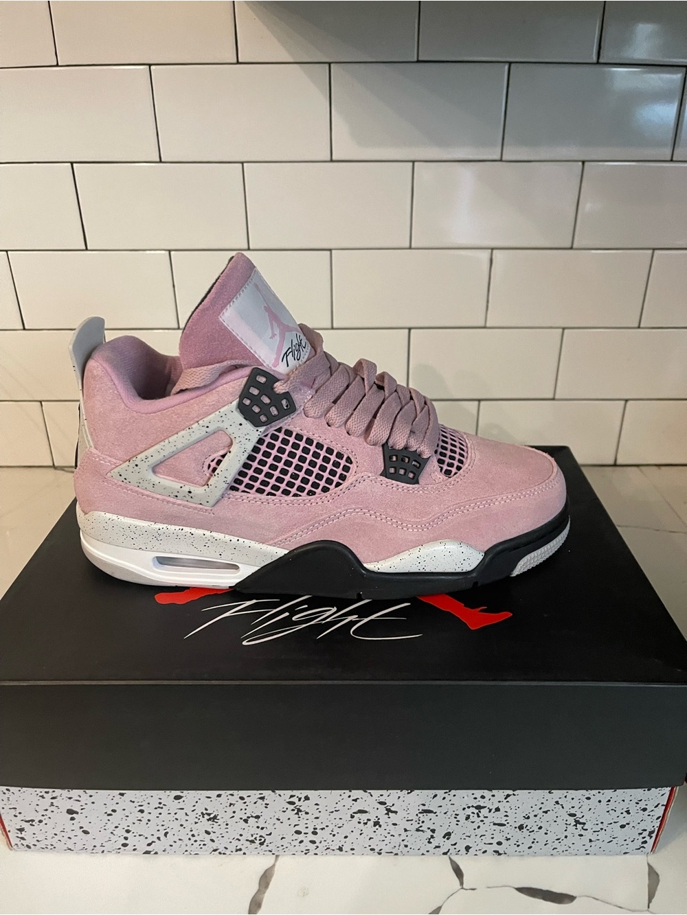 Men’s Retro 4 Pink Orchid Size 7.5.